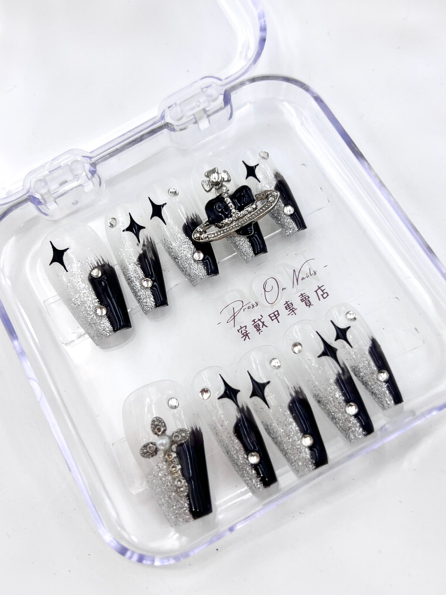 Naked white and black three-dimensional planet-press on nails